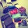 Piles of clothes ready to pack